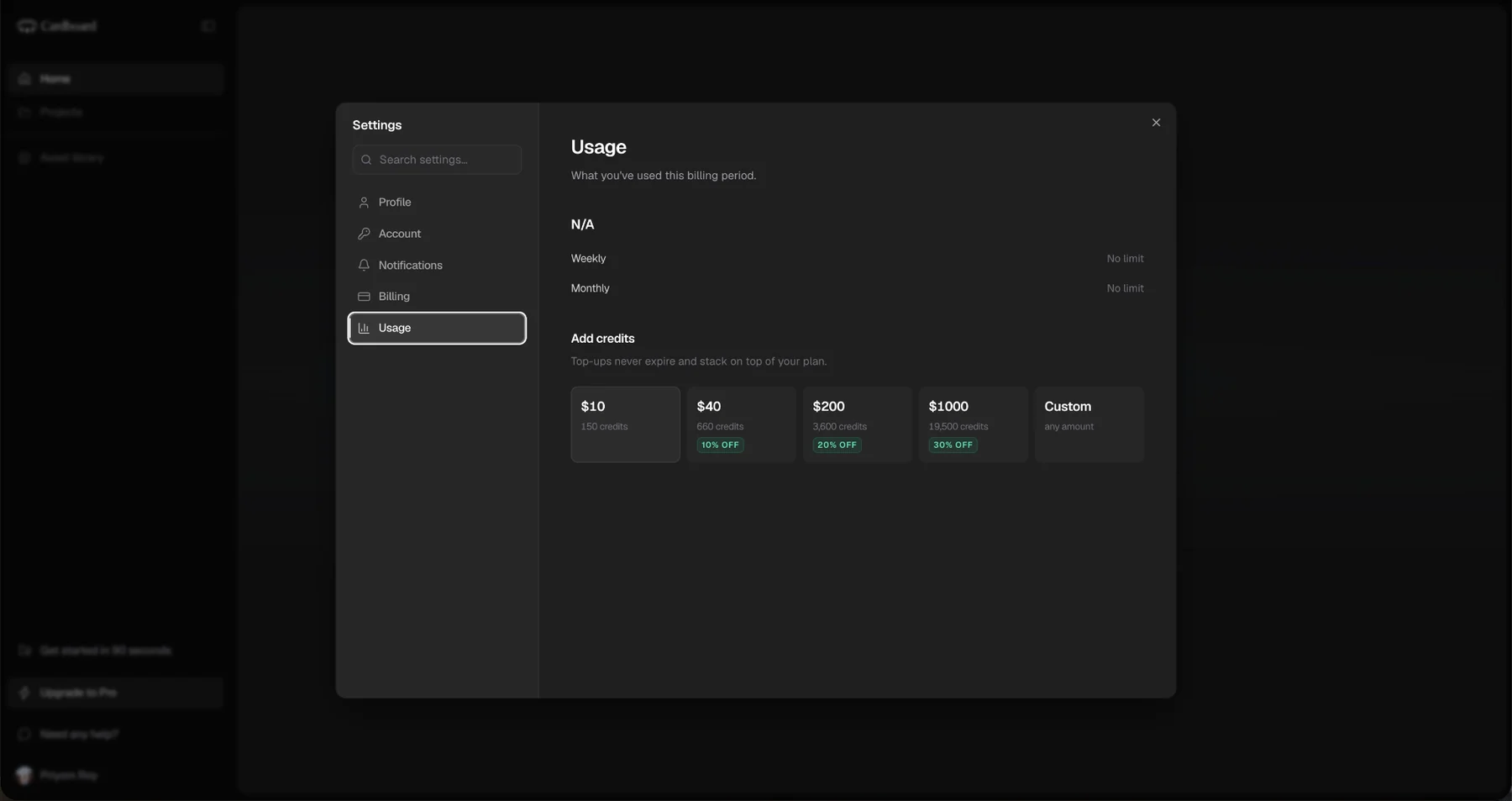 The Settings dialog open on Usage. Under the heading, the line "What you’ve used this billing period." Below it "N/A", then a row reading Weekly and, right-aligned, "No limit", and a row reading Monthly and "No limit". Beneath that an "Add credits" section with tiles for $10, $40, $200, $1000 and Custom, and the line "Top-ups never expire and stack on top of your plan."